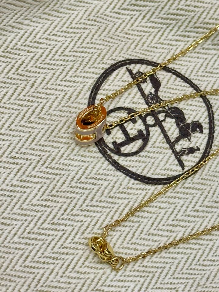 Hermès H-Letter Oval Enamel Necklace in Gold