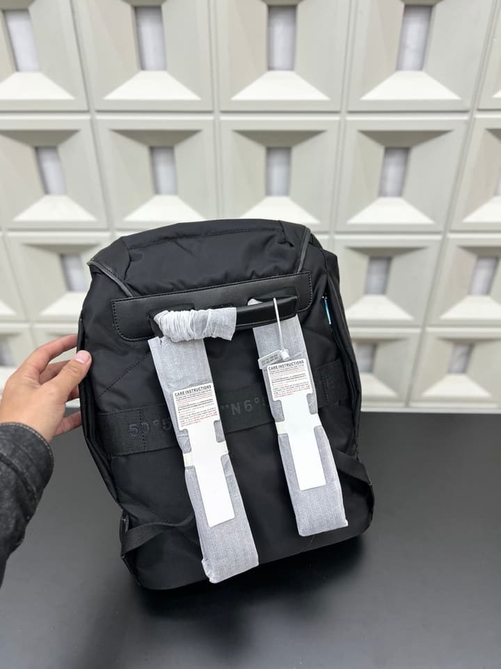 RIMOWA Signature Series Flap Drawstring Backpack in Classic Black
