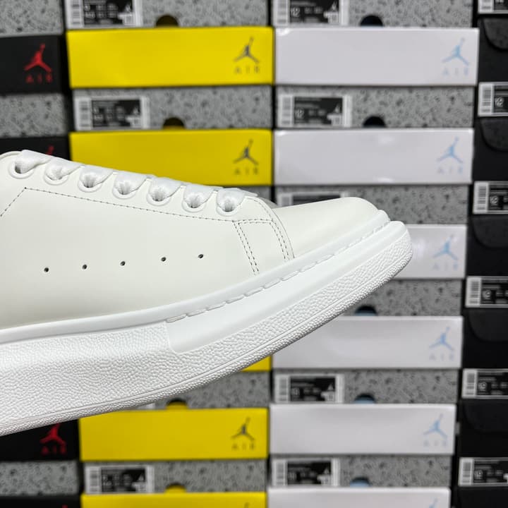 Alexander McQueen Oversized Low-Top Sneakers in All Black With White Sole