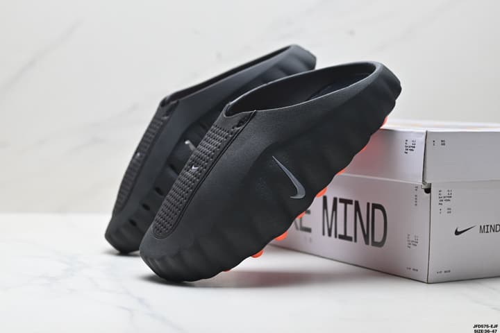 Nike Mind 001 Recovery Slide in Black With Orange Nodes