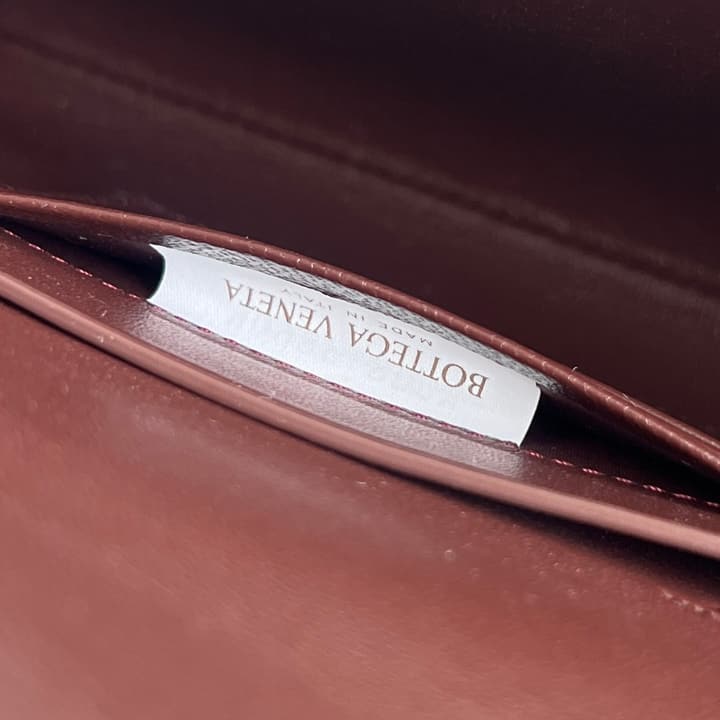 Bottega Veneta Crocodile Embossed Intrecciato Clutch in Gold