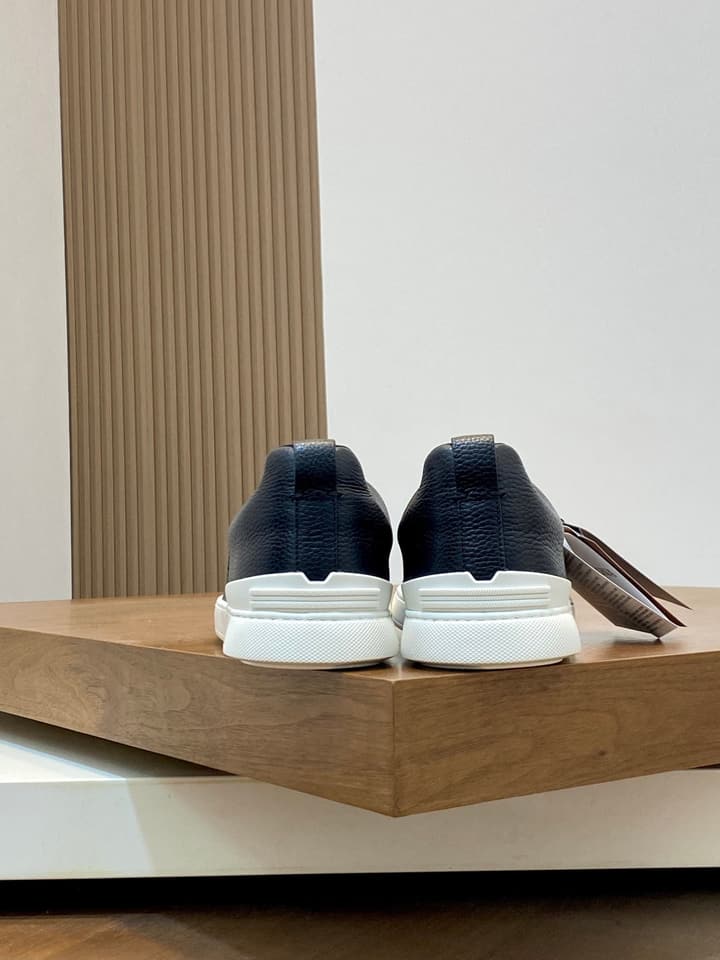 Ermenegildo Zegna Triple Stitch Sneakers in Black Leather With Brown Tag