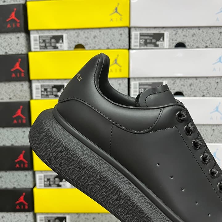 Alexander McQueen Oversized Low-Top Sneakers in All Black With White Sole