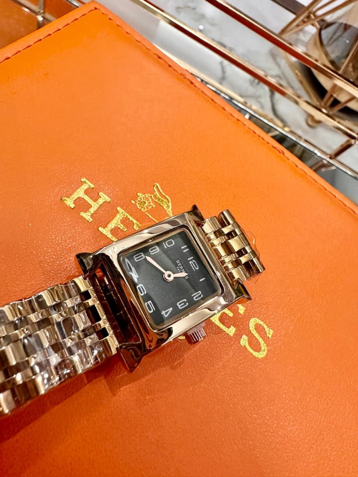 Hermès Small Square Luxury Watch in Dark Dial Patterned Gold Bracelet