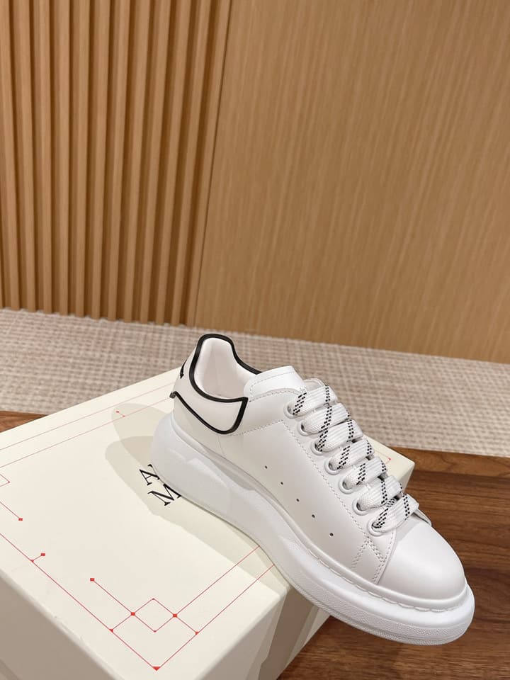 Alexander McQueen Classic Versatile White Sneakers in White With Black Laces & Heel