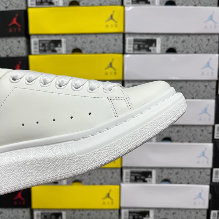 Alexander McQueen Oversized Low-Top Sneakers in All Black With White Sole