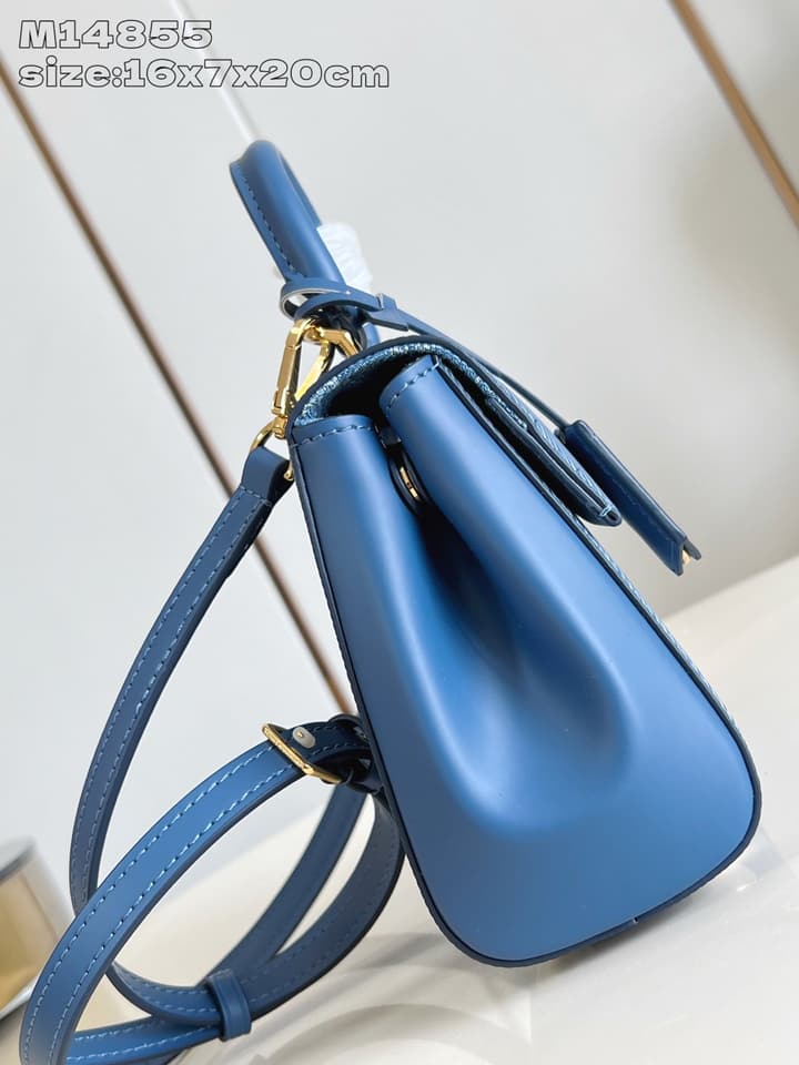 Louis Vuitton Cluny Mini Handbag in Beige
