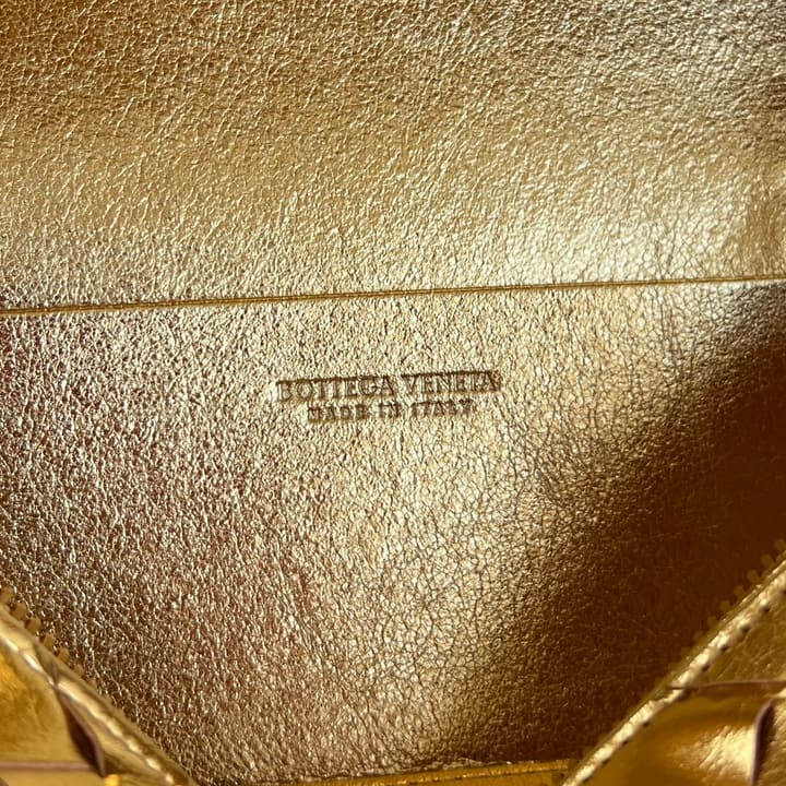 Bottega Veneta Intrecciato Vanity Case in Metallic Gold