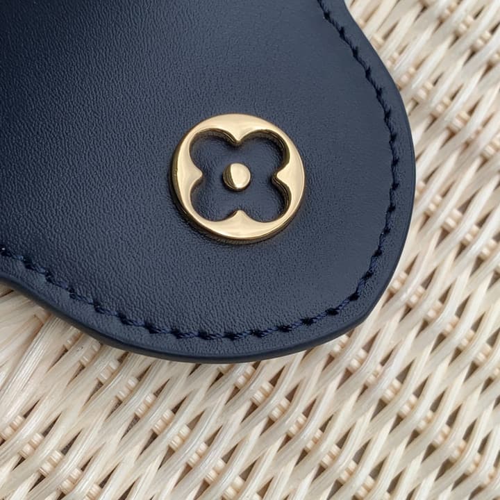 Louis Vuitton Capucines Mini Handbag in Beige