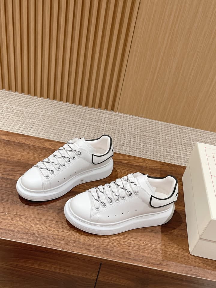 Alexander McQueen Classic Versatile White Sneakers in White With Black Laces & Heel
