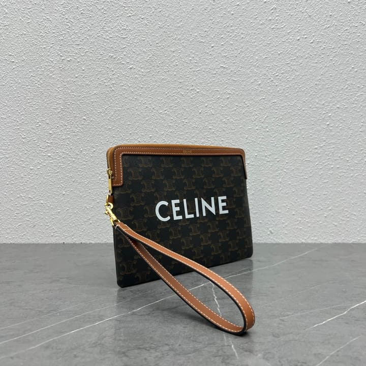 Celine Clutch Bag with Wrist Strap in Dark Monogram With Brown Trim