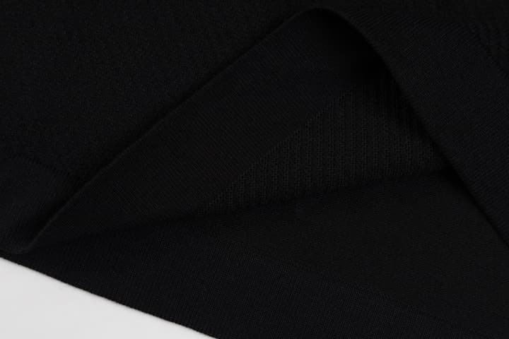 Hermès Retro Knitted Polo Shirt – SS24 in Black Polo With Orange Placket