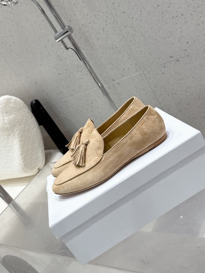 The Row Tassel Loafers in Black Suede