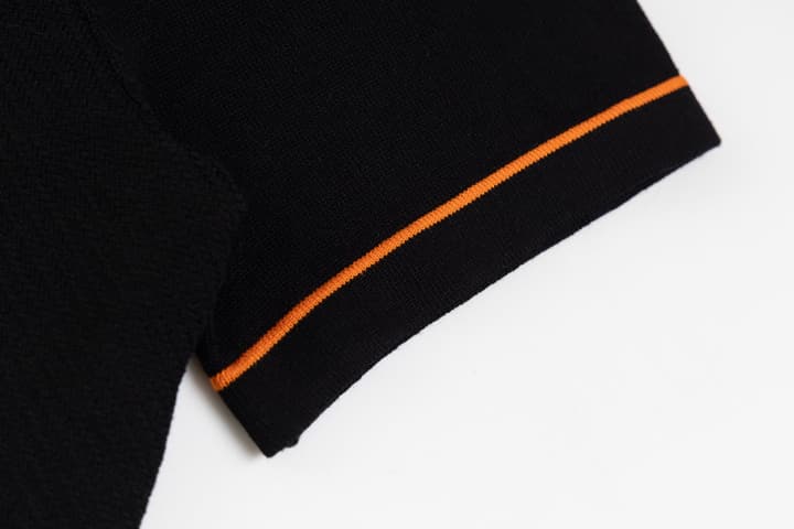 Hermès Retro Knitted Polo Shirt – SS24 in Black Polo With Orange Placket