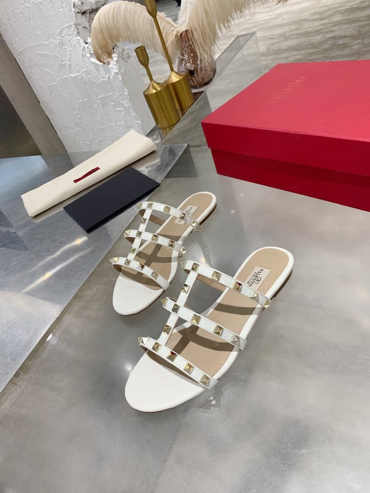 Valentino Studded Sheepskin Flat Sandals in Black