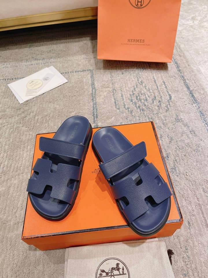 Hermès Chypre Suede Unisex Slides in Black With Dark Blue Strap