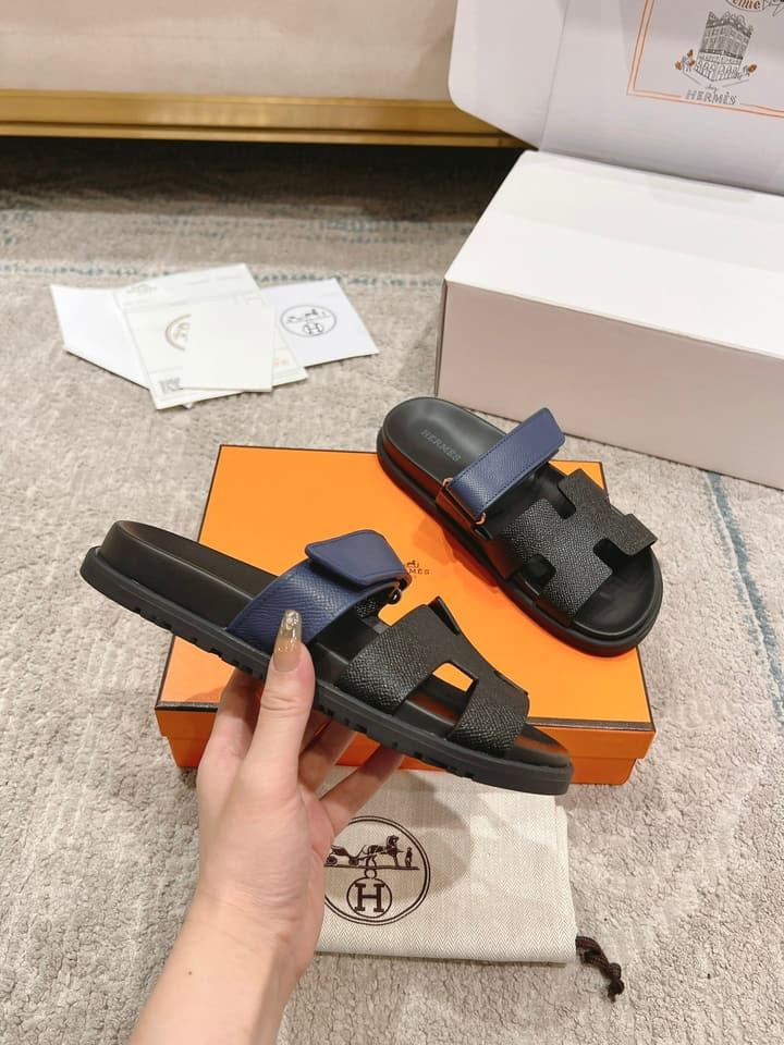 Hermès Chypre Suede Unisex Slides in Black With Dark Blue Strap