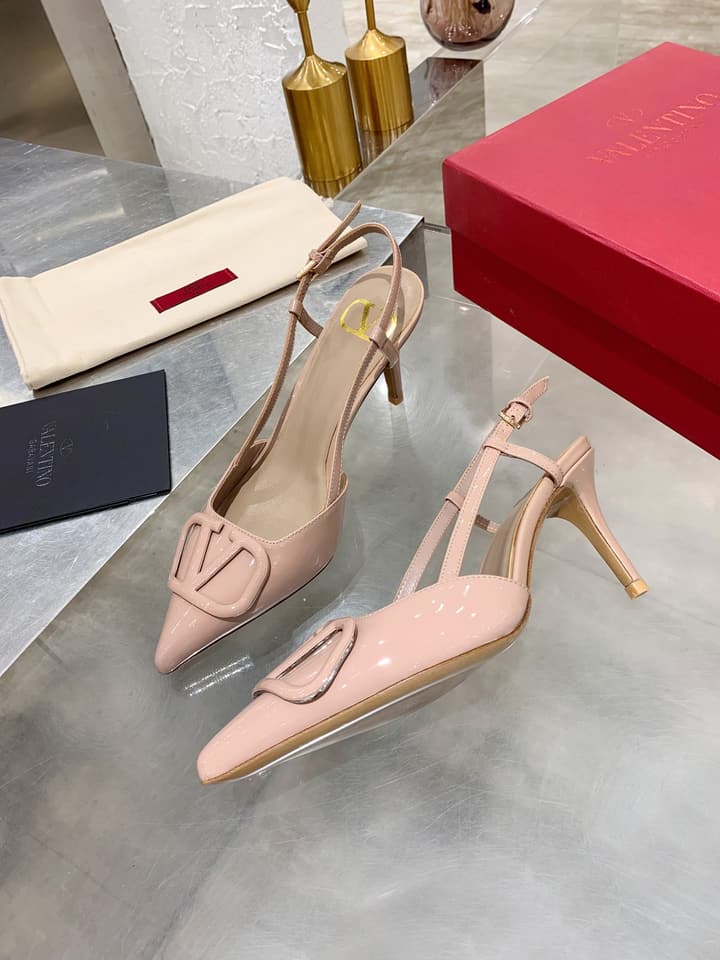 Valentino VLogo Pointed-Toe Patent Leather Pumps in Black Patent