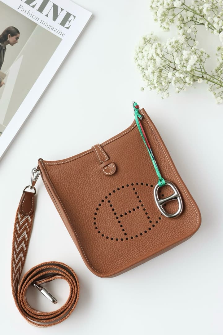 Hermès Mini Evelyne TPM – Gold Brown in Gold Brown With Patterned Strap