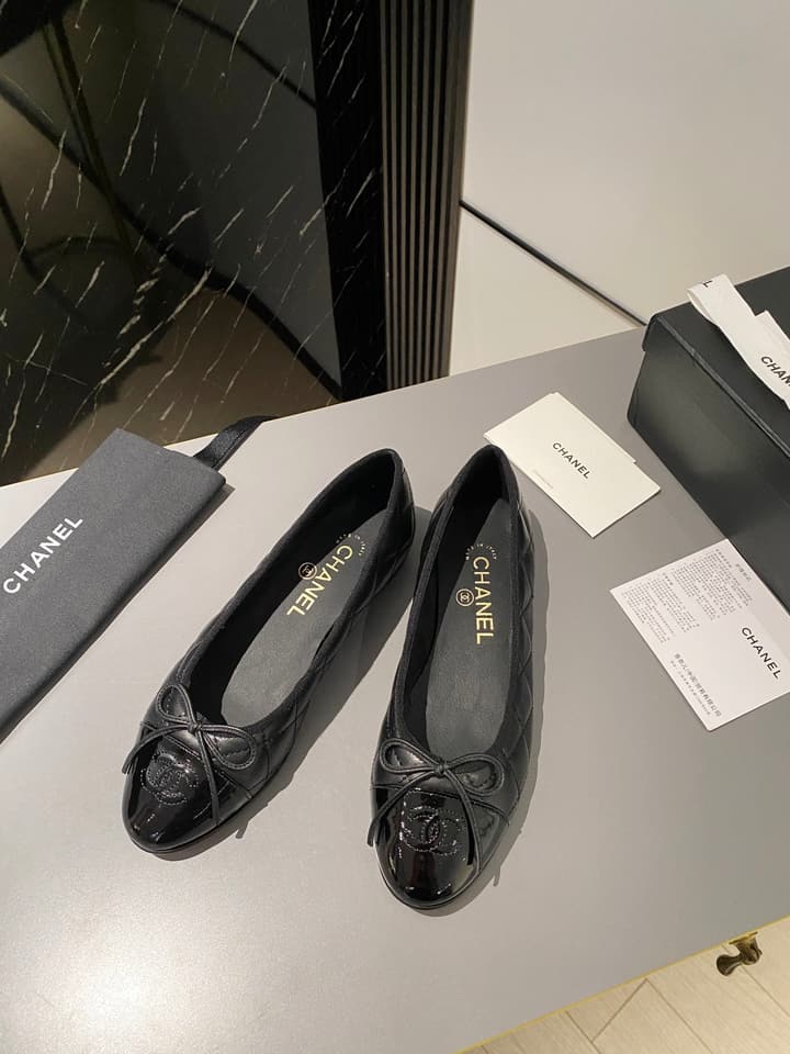 Chanel Classic Ballet Flats in Tan With Black Cap Toe