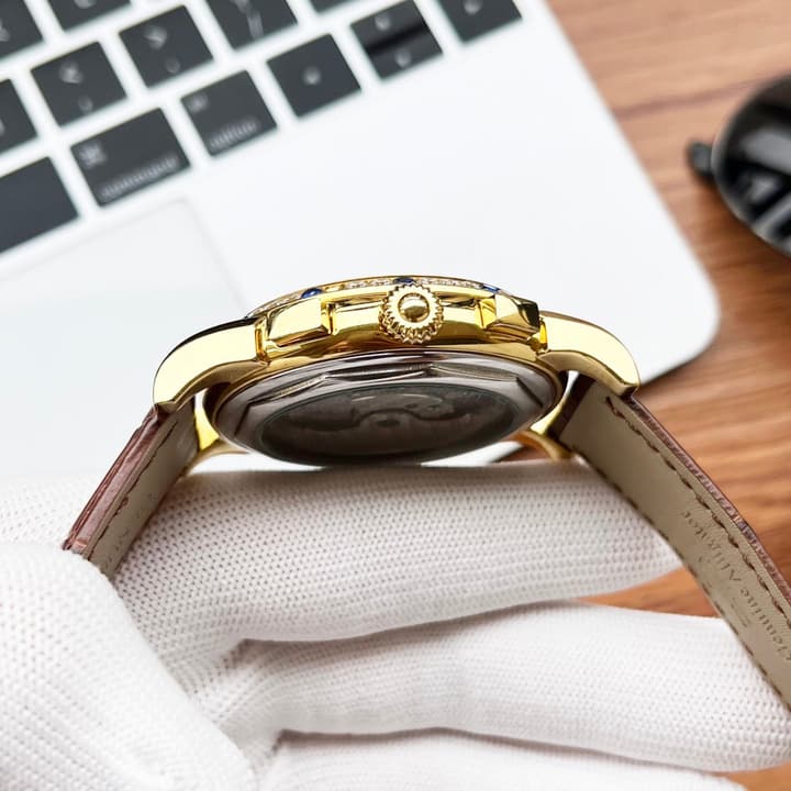 Patek Philippe Men's Automatic Watch in Gold