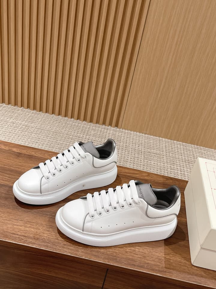 Alexander McQueen Classic Versatile White Sneakers in White With Black Laces & Heel