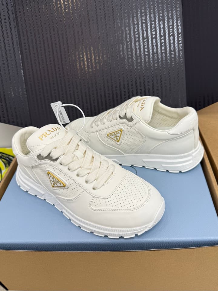 Prada Triangle Logo Sporty Sneakers – 2025 Early Autumn Collection in Black