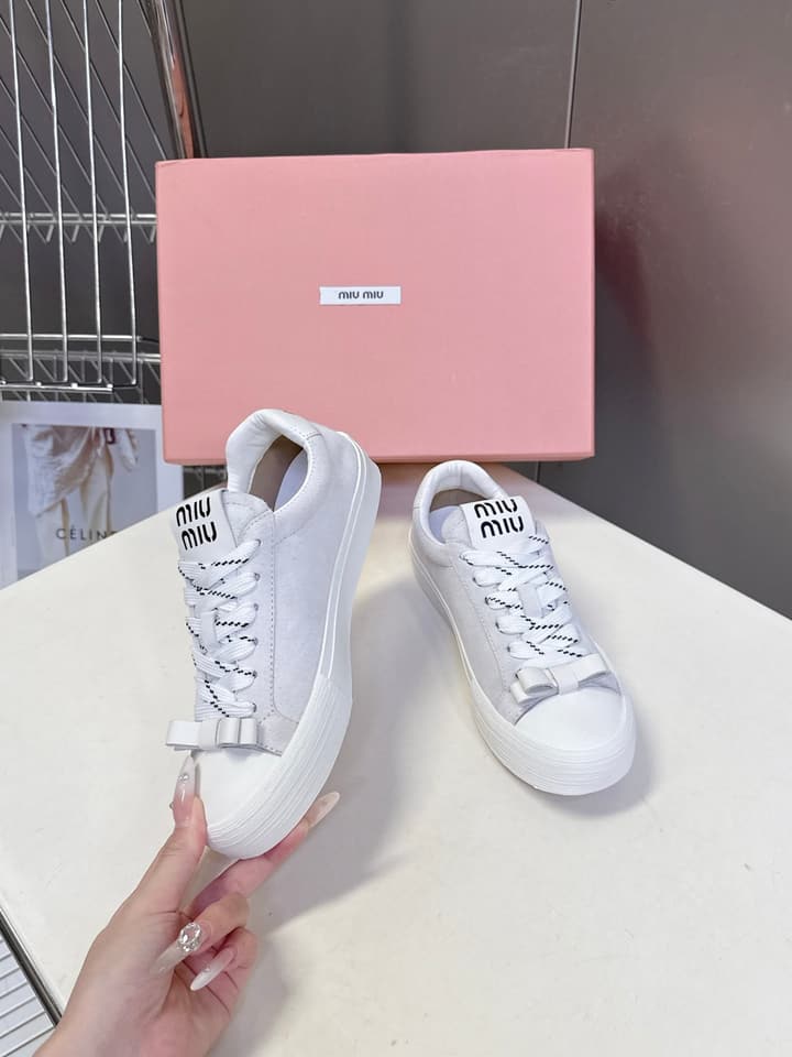 Miu Miu Distressed Retro Double Lace Sneakers in Red