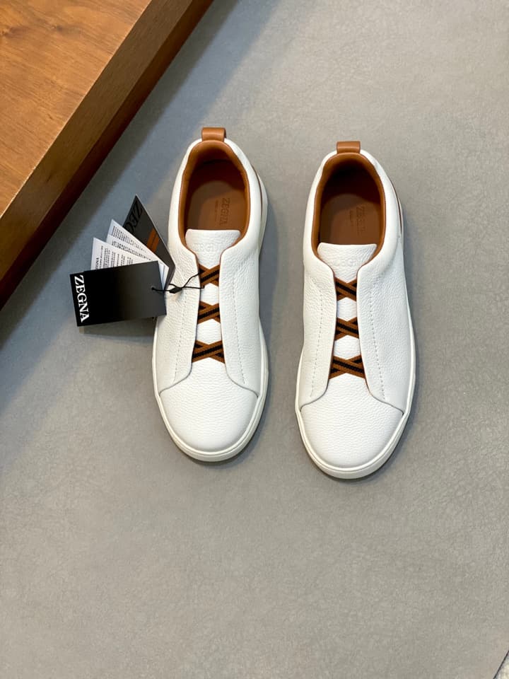 Ermenegildo Zegna Triple Stitch Sneakers in Black Leather With Brown Tag