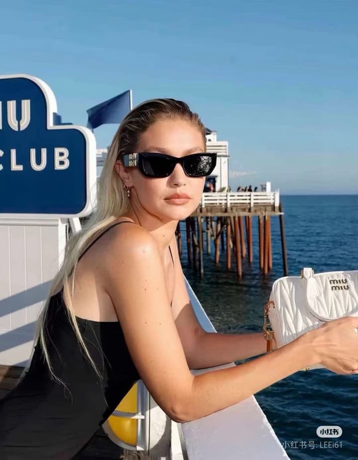 Miu Miu 2025 Cat-Eye Sunglasses – 2025 Collection in Gold