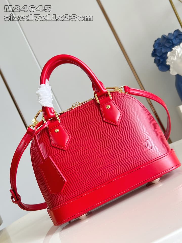 Louis Vuitton Alma BB Handbag in Beige