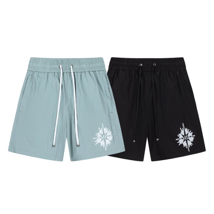 Amiri Logo Print Swim Trunks in Black