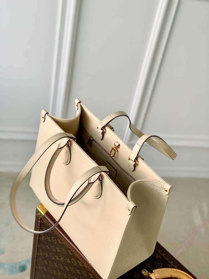 Louis Vuitton OnTheGo Medium Monogram Empreinte Tote in Cream Monogram Empreinte