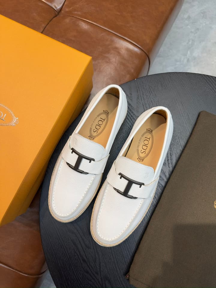 Tod's Gommino Calfskin Loafers in Assorted Loafers Display