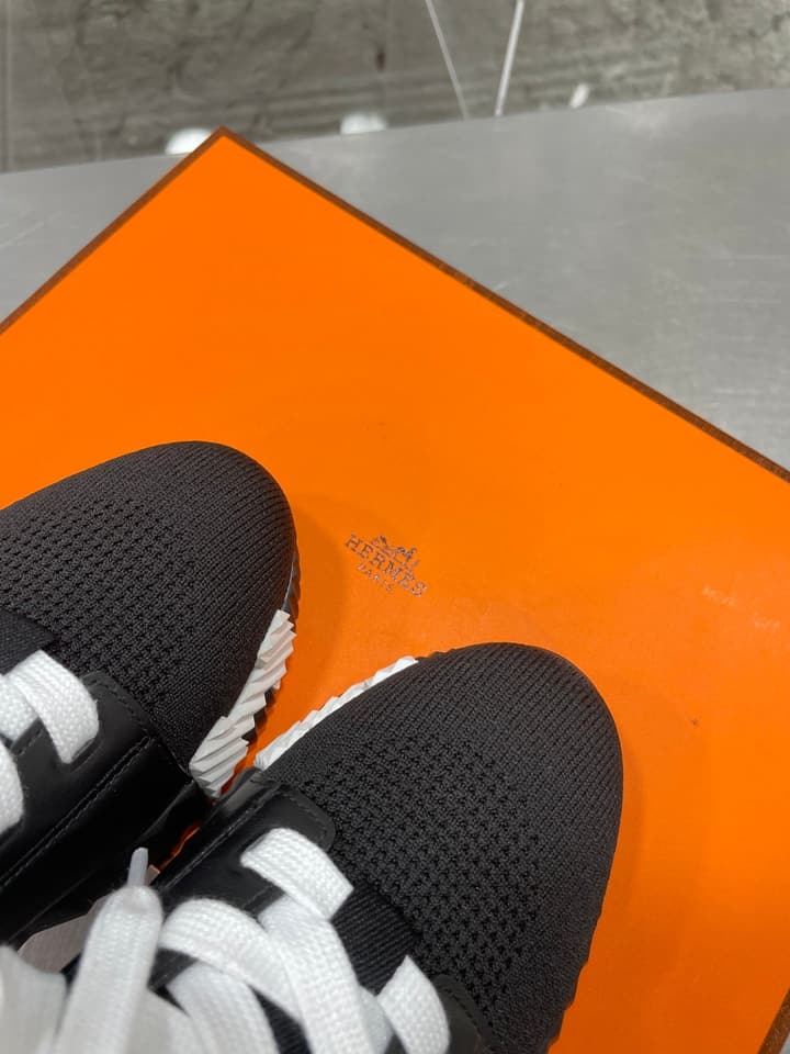 Hermès Sport Sneakers – Iconic Orange Edge in Black Knit With Black Laces