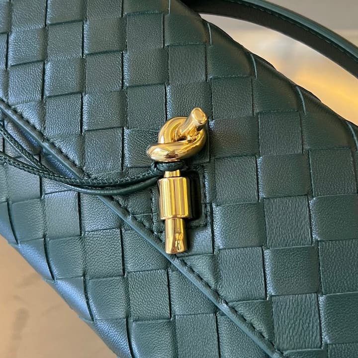 Bottega Veneta Intrecciato Knot Clutch Bag in Gold