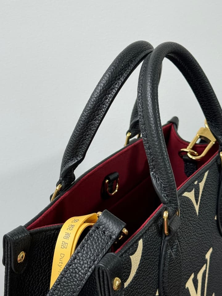 Louis Vuitton OnTheGo Small Tote Bag in Black Contrasting Monogram With Red Lining