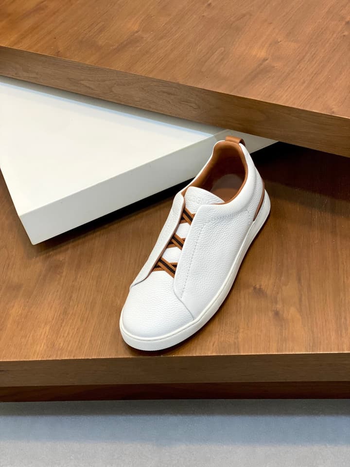 Ermenegildo Zegna Triple Stitch Sneakers in Black Leather With Brown Tag