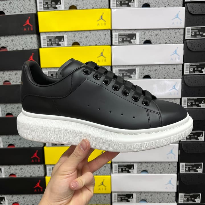 Alexander McQueen Oversized Low-Top Sneakers in All Black With White Sole