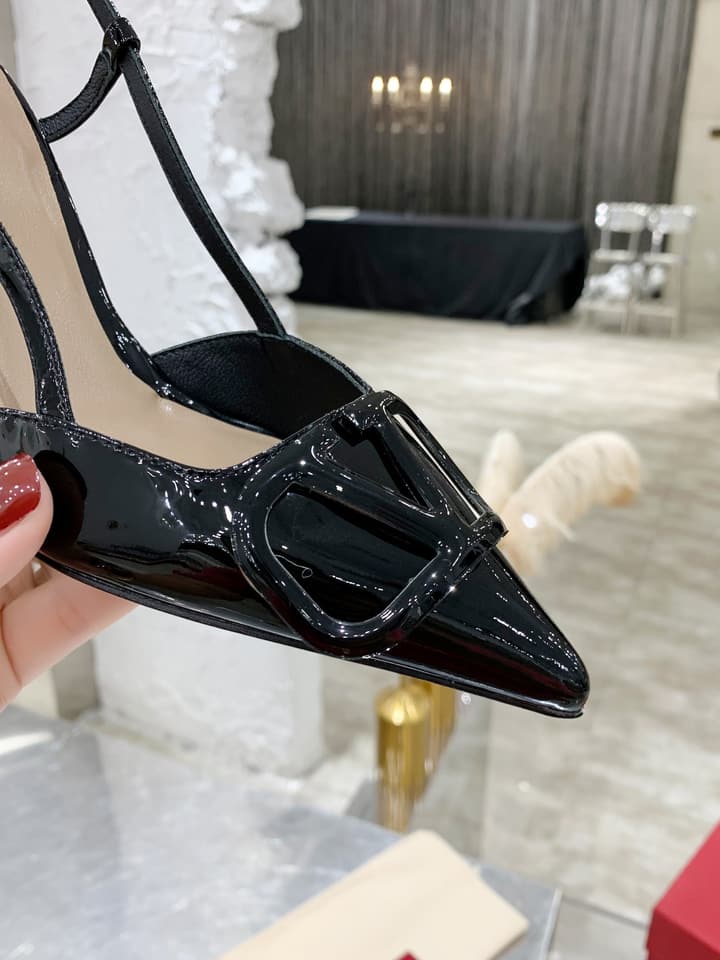 Valentino VLogo Pointed-Toe Patent Leather Pumps in Black Patent