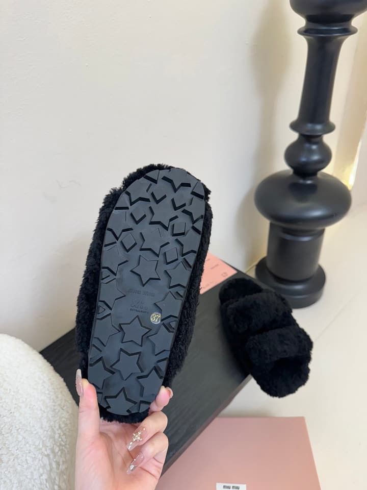 Miu Miu Sheepskin Mules in Black