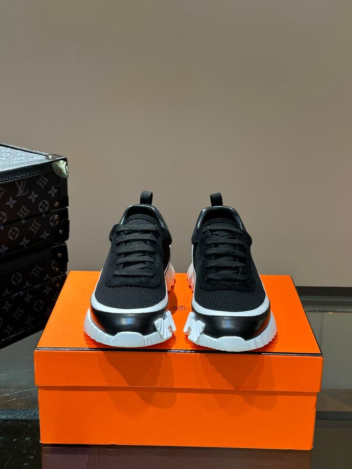 Hermès Bouncing Calfskin Mesh Sneakers in Black With White Stripe