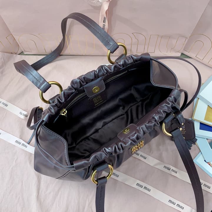 Miu Miu Tassel Drawstring Bucket Bag – New Collection in Black