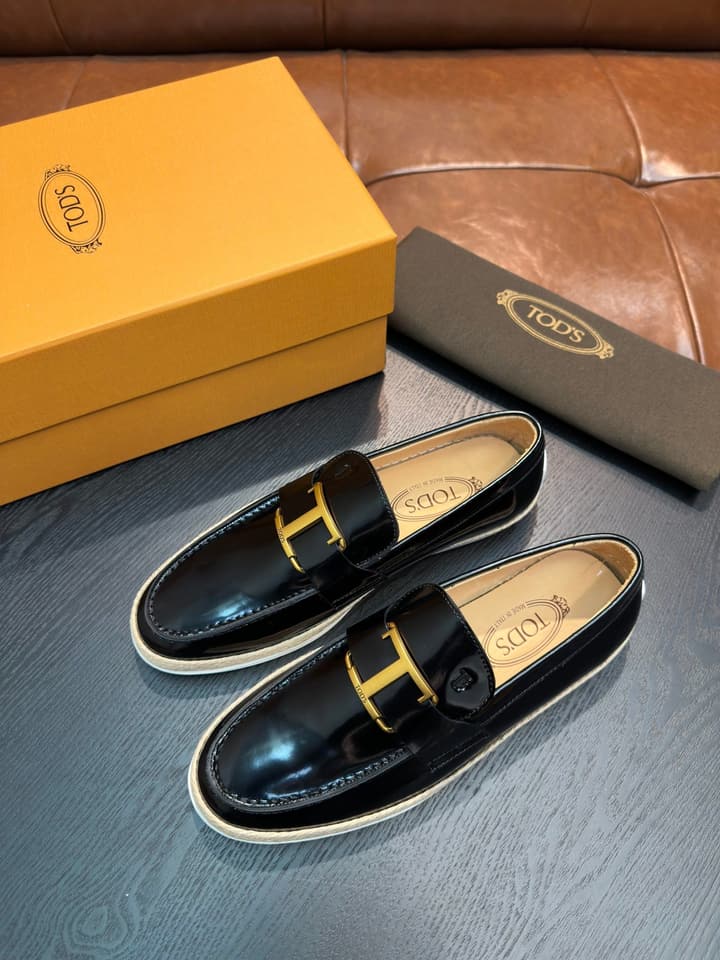 Tod's Gommino Calfskin Loafers in Assorted Loafers Display