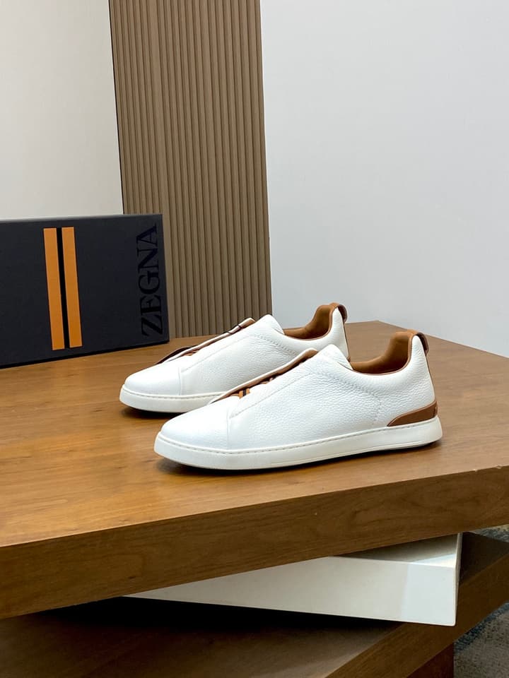 Ermenegildo Zegna Triple Stitch Sneakers in Black Leather With Brown Tag