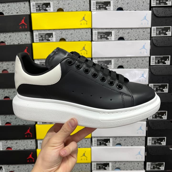 Alexander McQueen Oversized Low-Top Sneakers in All Black With White Sole