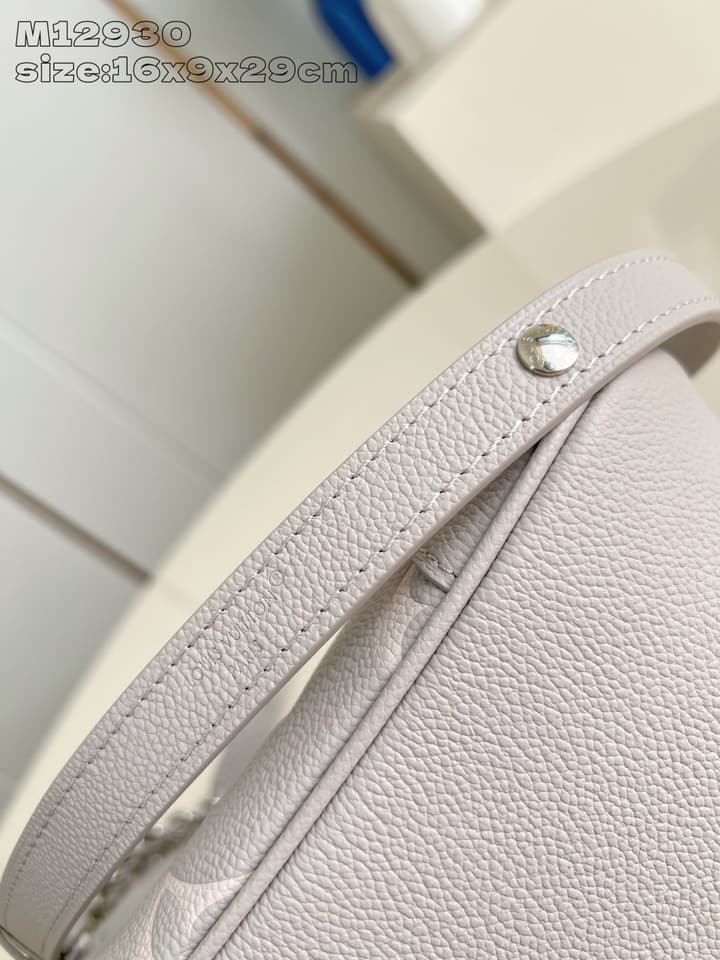 Louis Vuitton Boulogne Monogram Embossed Bag in Beige