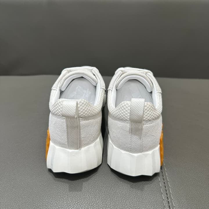 Hermès Bouncing Sneakers in Bright White With Orange H