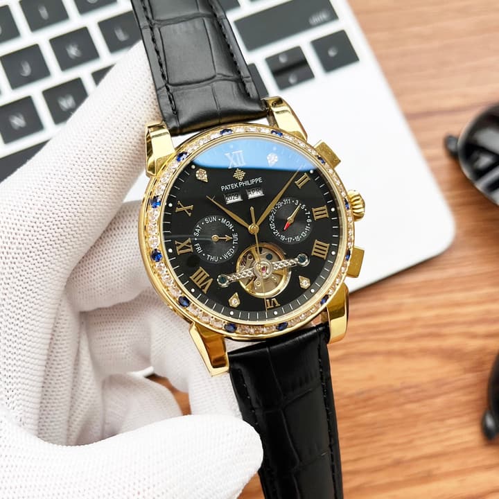 Patek Philippe Men's Automatic Watch in Gold