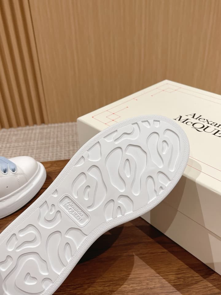 Alexander McQueen Classic Versatile White Sneakers in White With Black Laces & Heel